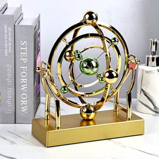 🔥Pendule à mouvement perpétuel en orbite céleste – Décoration rotative créative pour la maison
